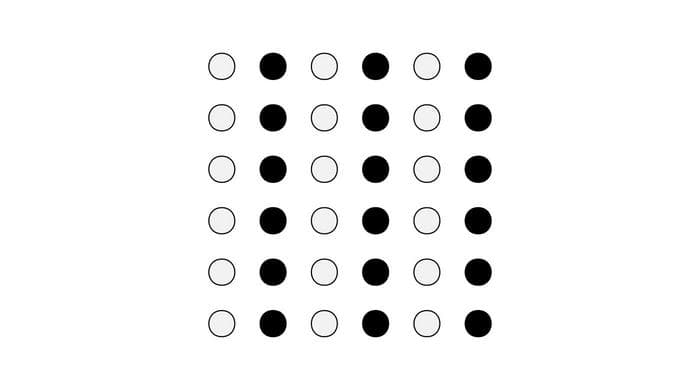 Gestalt grouping. Objects that are similar in color, shape, and brightness appear connected.